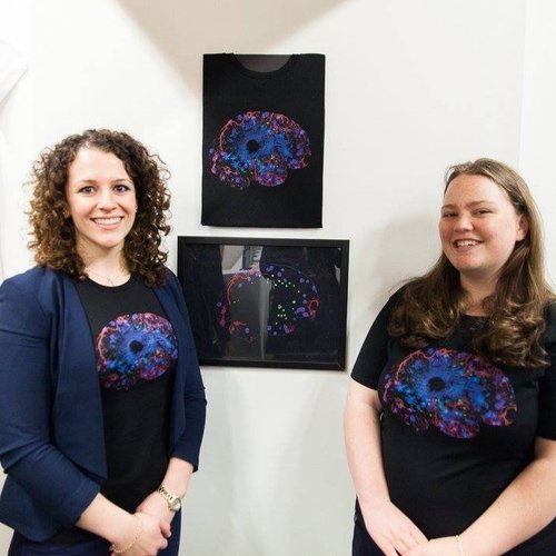 Team Brain, Francesca and Mahnee, smiling in their shirt design