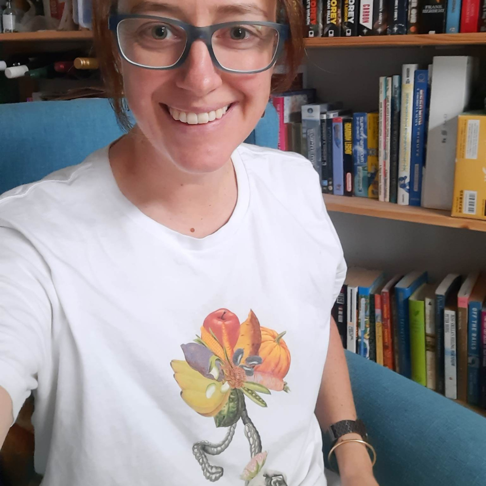 Women smiling with her Heart Disease Prevention shirt